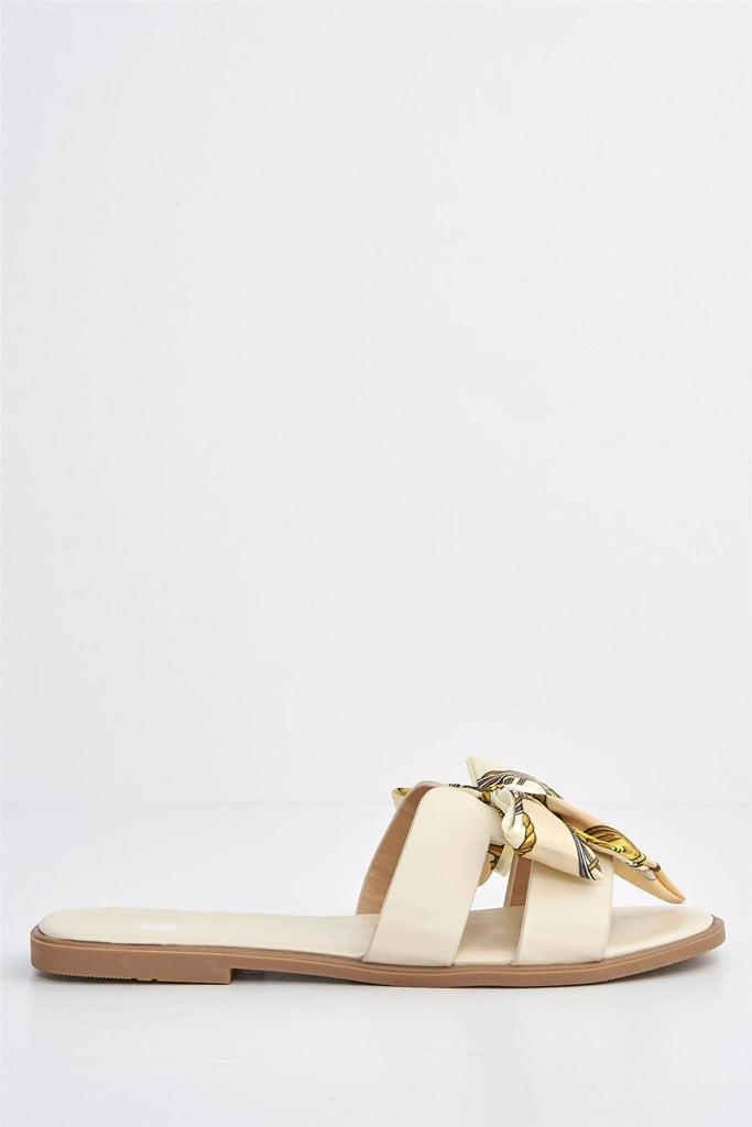 Izzy Printed Bow Flat Sandal in Nude Flats Miss Diva 