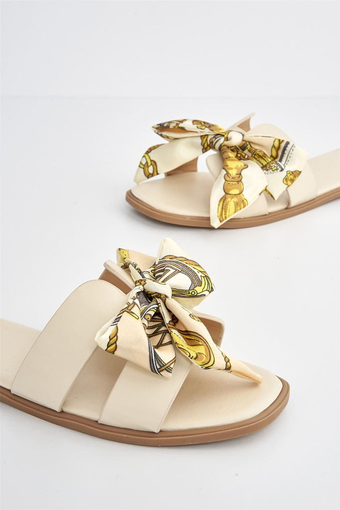 Izzy Printed Bow Flat Sandal in Nude Flats Miss Diva 